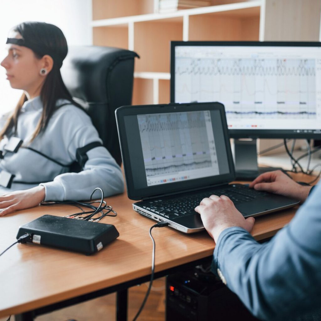 checking-truth-girl-passes-lie-detector-office-asking-questions-polygraph-test_146671-17219